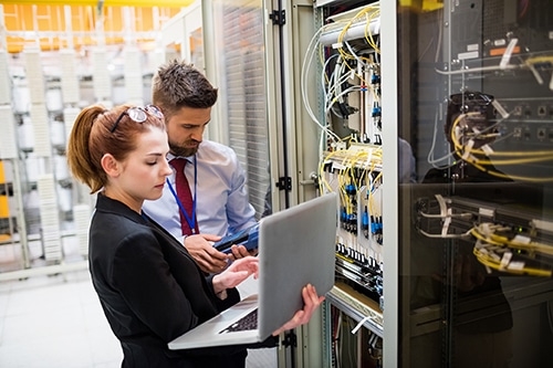 IT techs working in the server room